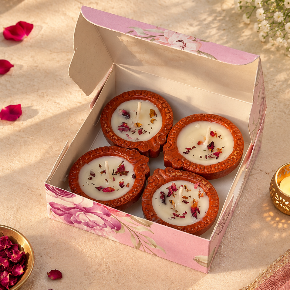 Gulessence handmade soy wax diya candle with rose petals in a terracotta diya
